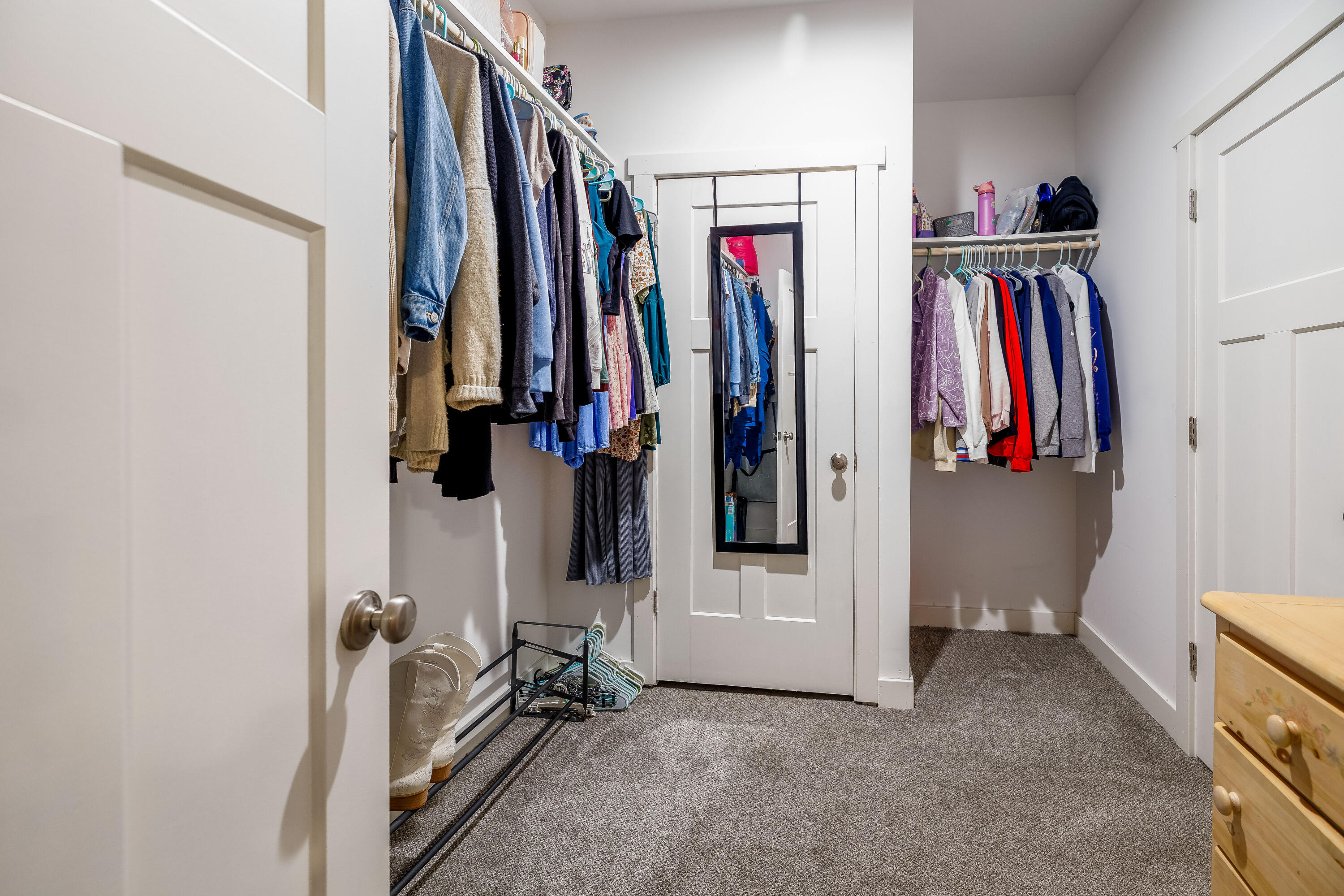 6795 Whispering Woods Drive Demotte, IN 46310 - Photo 52 of 64 a view of walk in closet with clothes