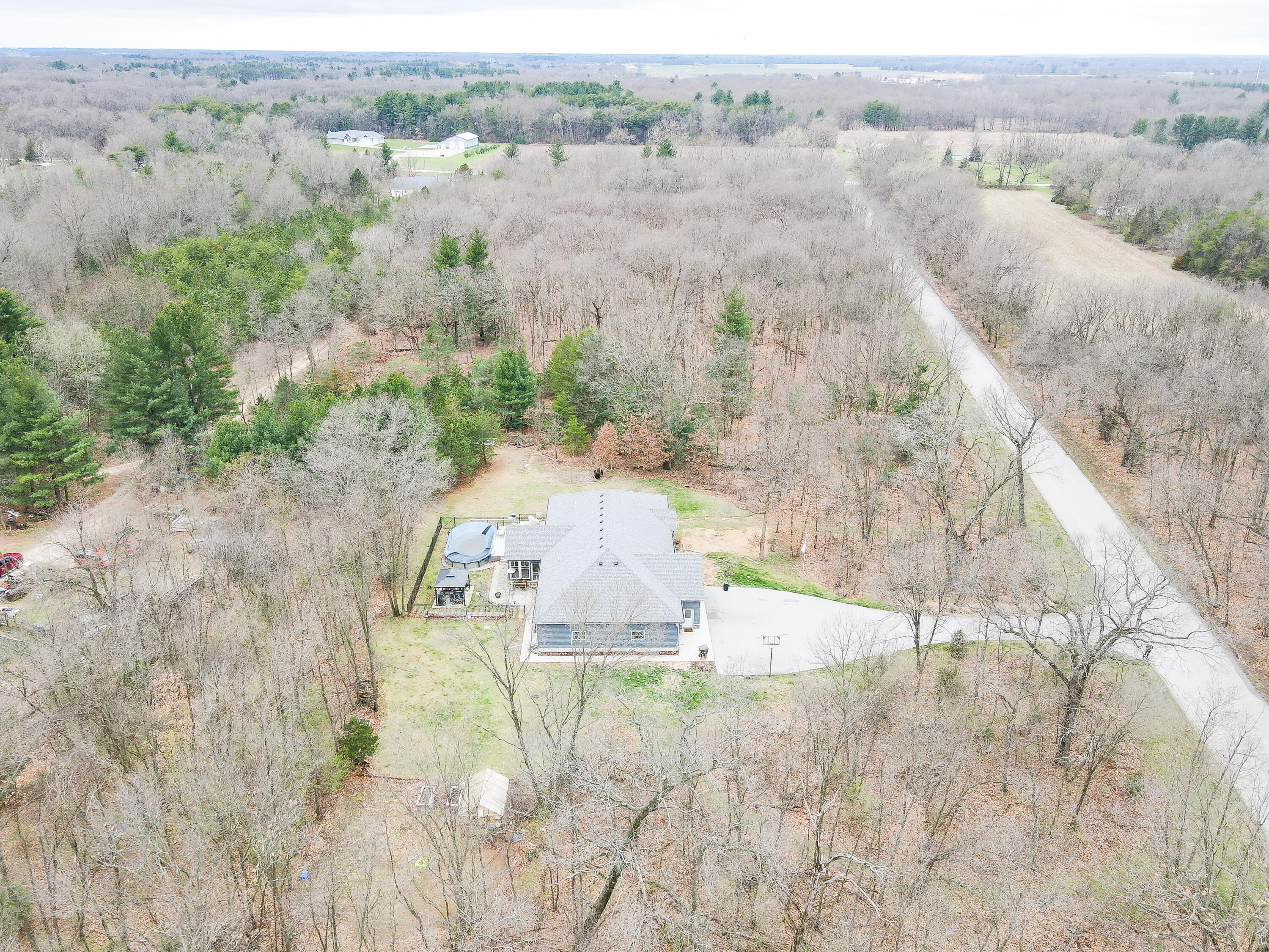 6795 Whispering Woods Drive Demotte, IN 46310 - Photo 8 of 64 an aerial view of residential houses with outdoor space