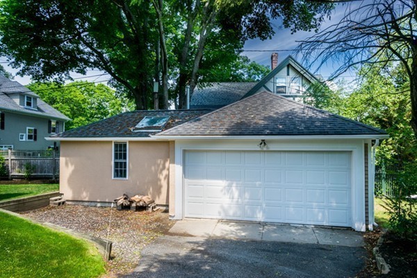 4 Bruce Road Winchester, MA 01890 - Photo 26 of 26 a front view of house with yard and trees