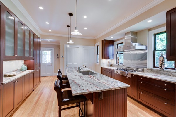 4 Bruce Road Winchester, MA 01890 - Photo 9 of 26 a large kitchen with granite countertop lots of counter space and sink