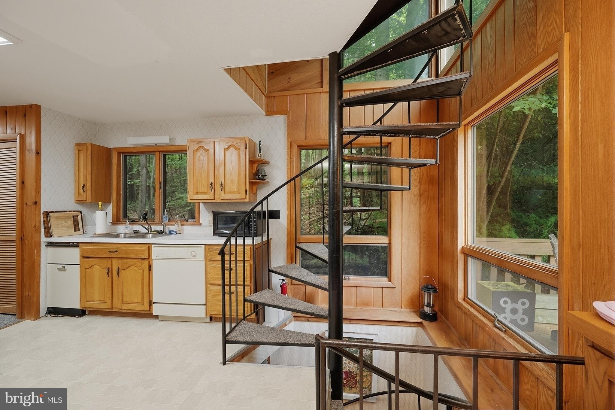 2153 Rock Lodge Road McHenry, MD 21541 - Photo 26 of 80 Charming spiral staircase in cozy kitchen.