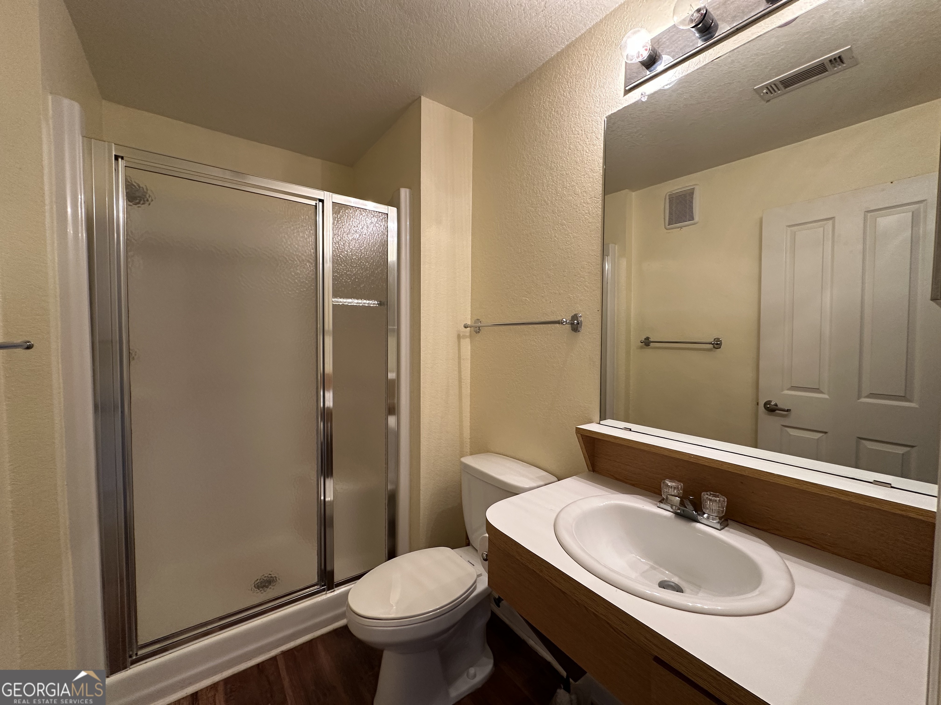 211 North Avenue Athens, GA 30601 - Photo 15 of 18 a bathroom with a sink toilet and shower