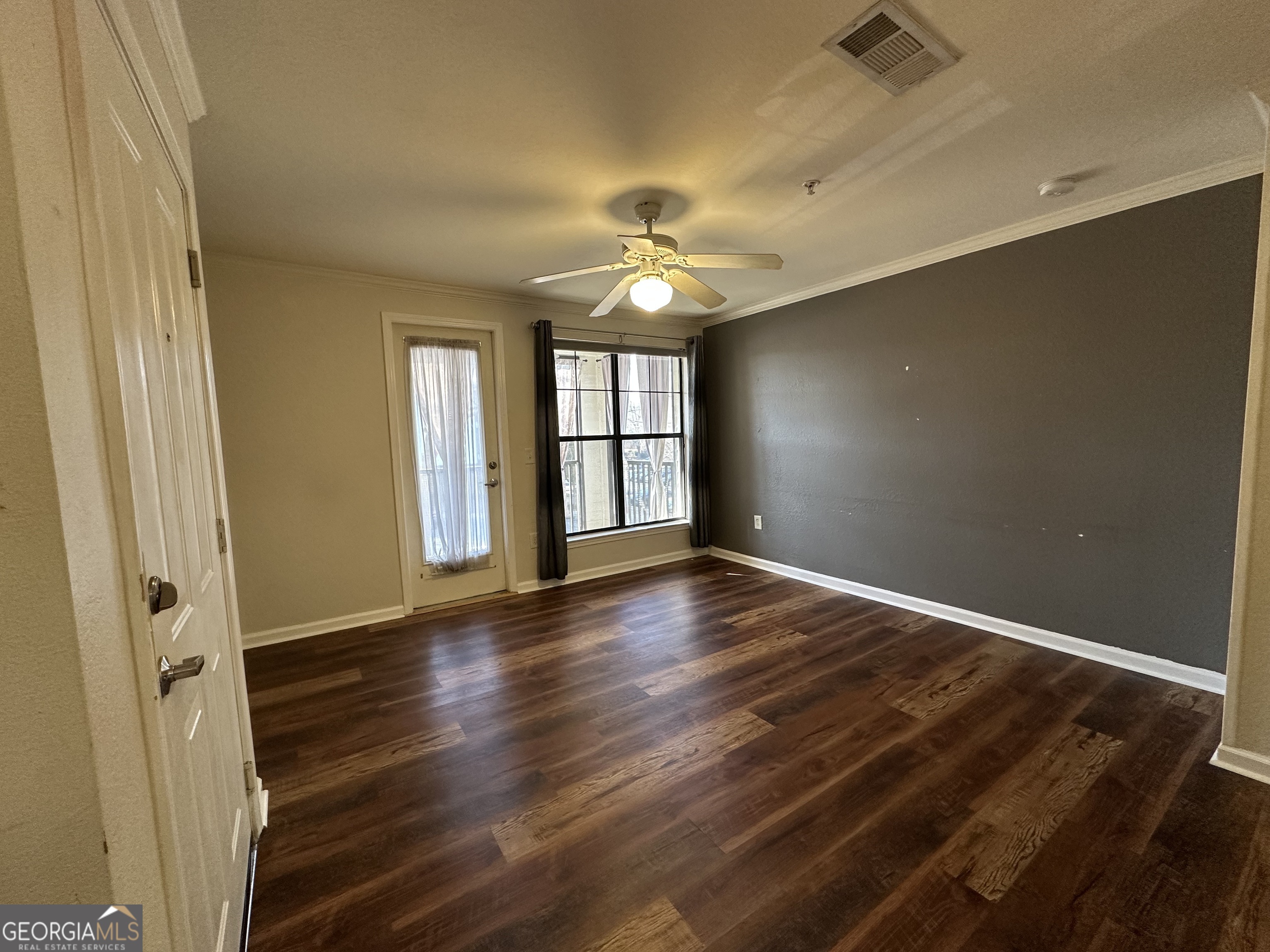 211 North Avenue Athens, GA 30601 - Photo 3 of 18 wooden floor in an empty room with a window