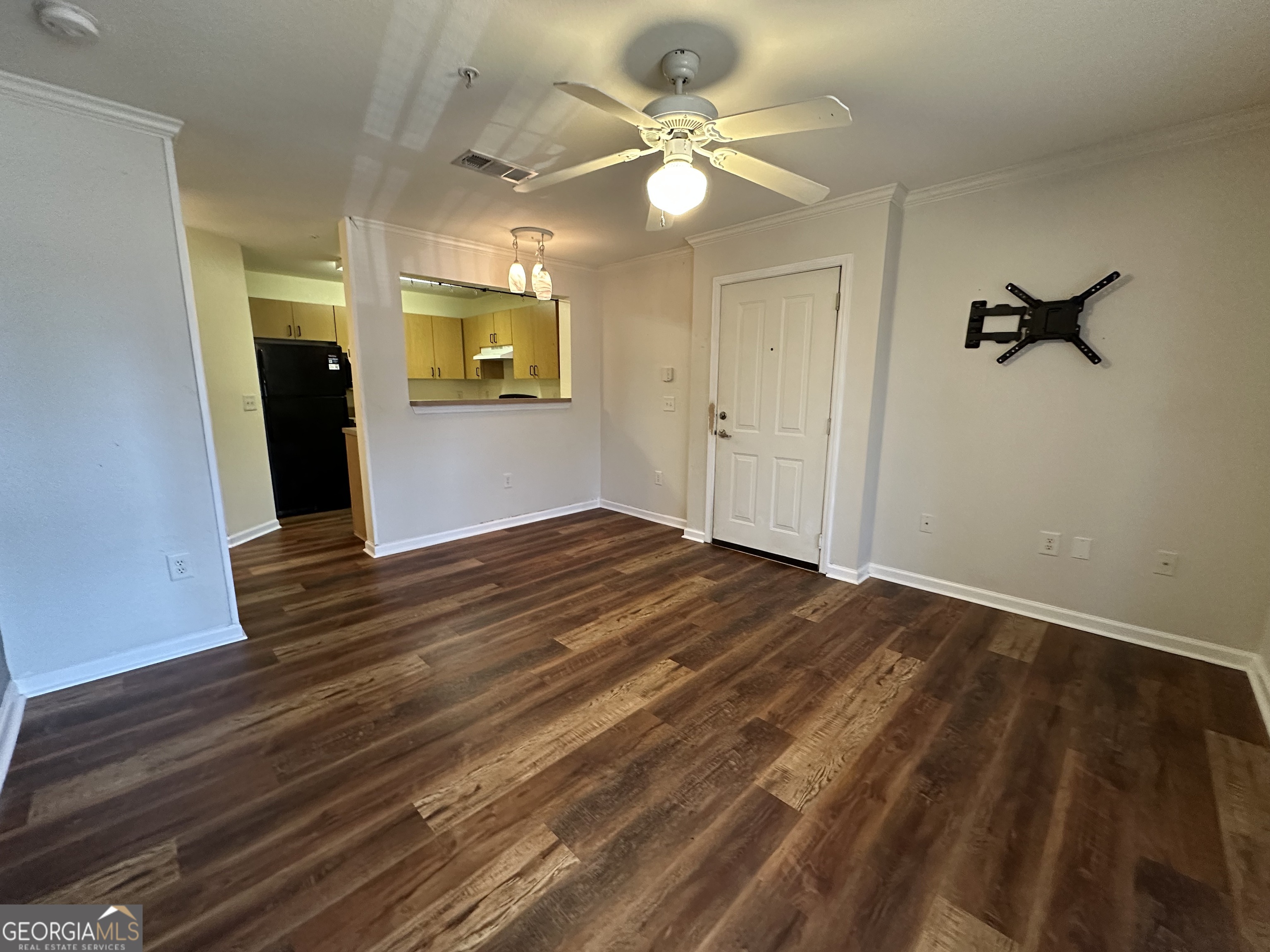 211 North Avenue Athens, GA 30601 - Photo 6 of 18 a view of a ceiling fan and wooden floor