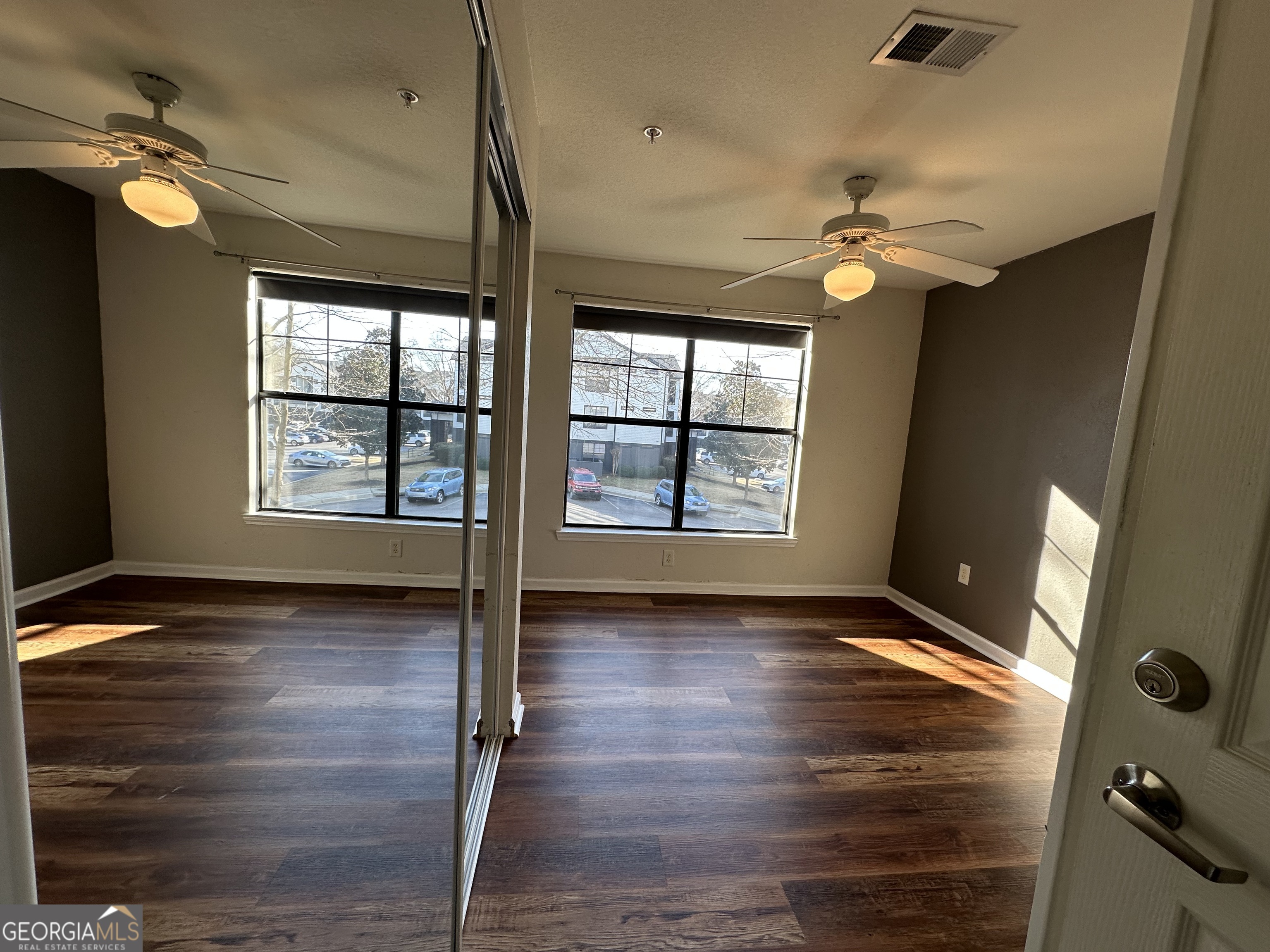211 North Avenue Athens, GA 30601 - Photo 10 of 18 wooden floor in an empty room with a window