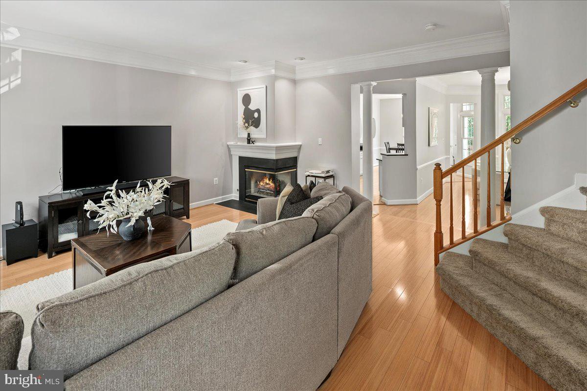 6347 Simmer Circle Springfield, VA 22150 - Photo 16 of 47 a living room with furniture and a flat screen tv
