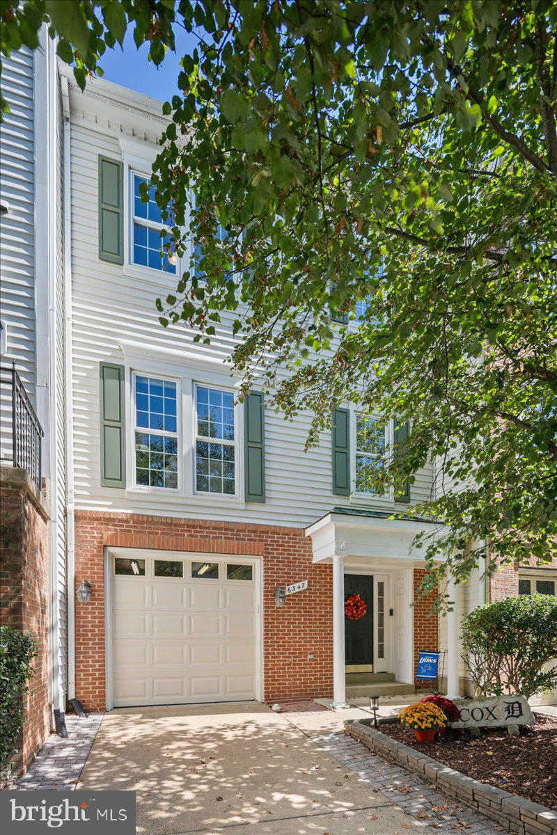 6347 Simmer Circle Springfield, VA 22150 - Photo 2 of 47 a front view of a house with a tree