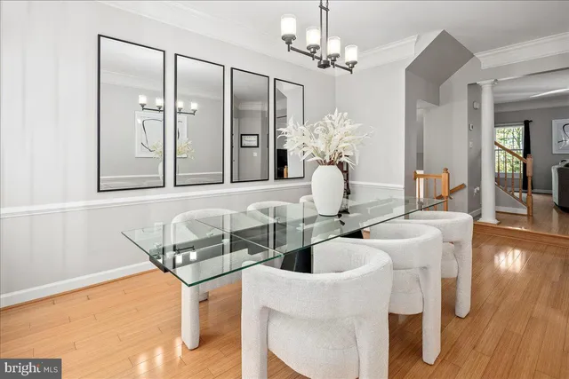 a bathroom with a granite countertop sink a mirror and bathtub