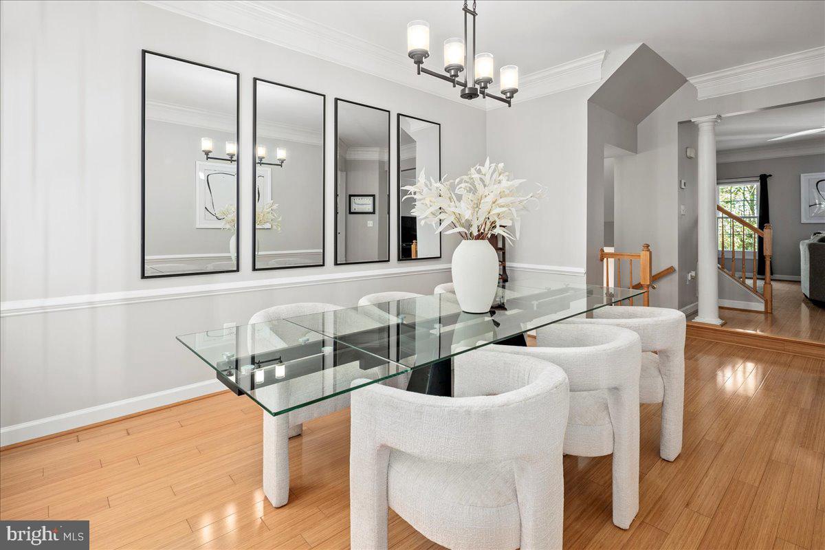 6347 Simmer Circle Springfield, VA 22150 - Photo 28 of 47 a bathroom with a granite countertop sink a mirror and bathtub