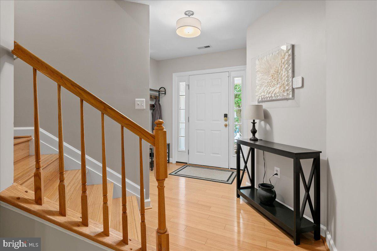 6347 Simmer Circle Springfield, VA 22150 - Photo 3 of 47 a view of an entryway with wooden floor