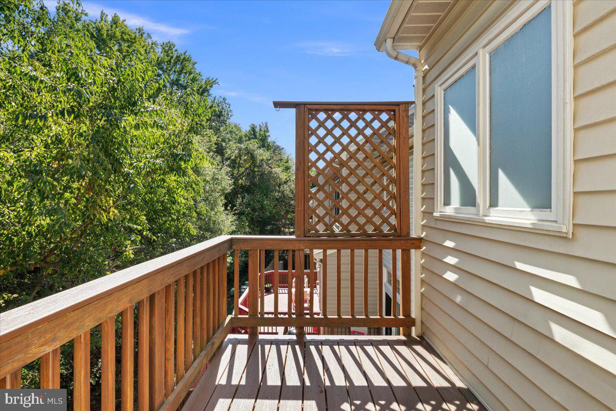 6347 Simmer Circle Springfield, VA 22150 - Photo 38 of 47 a view of balcony with wooden floor