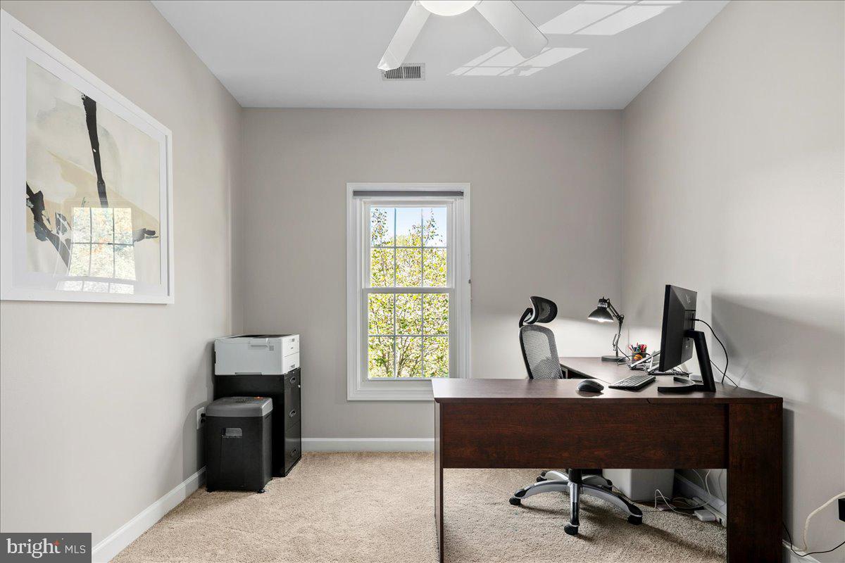 6347 Simmer Circle Springfield, VA 22150 - Photo 39 of 47 a living room with furniture and a window