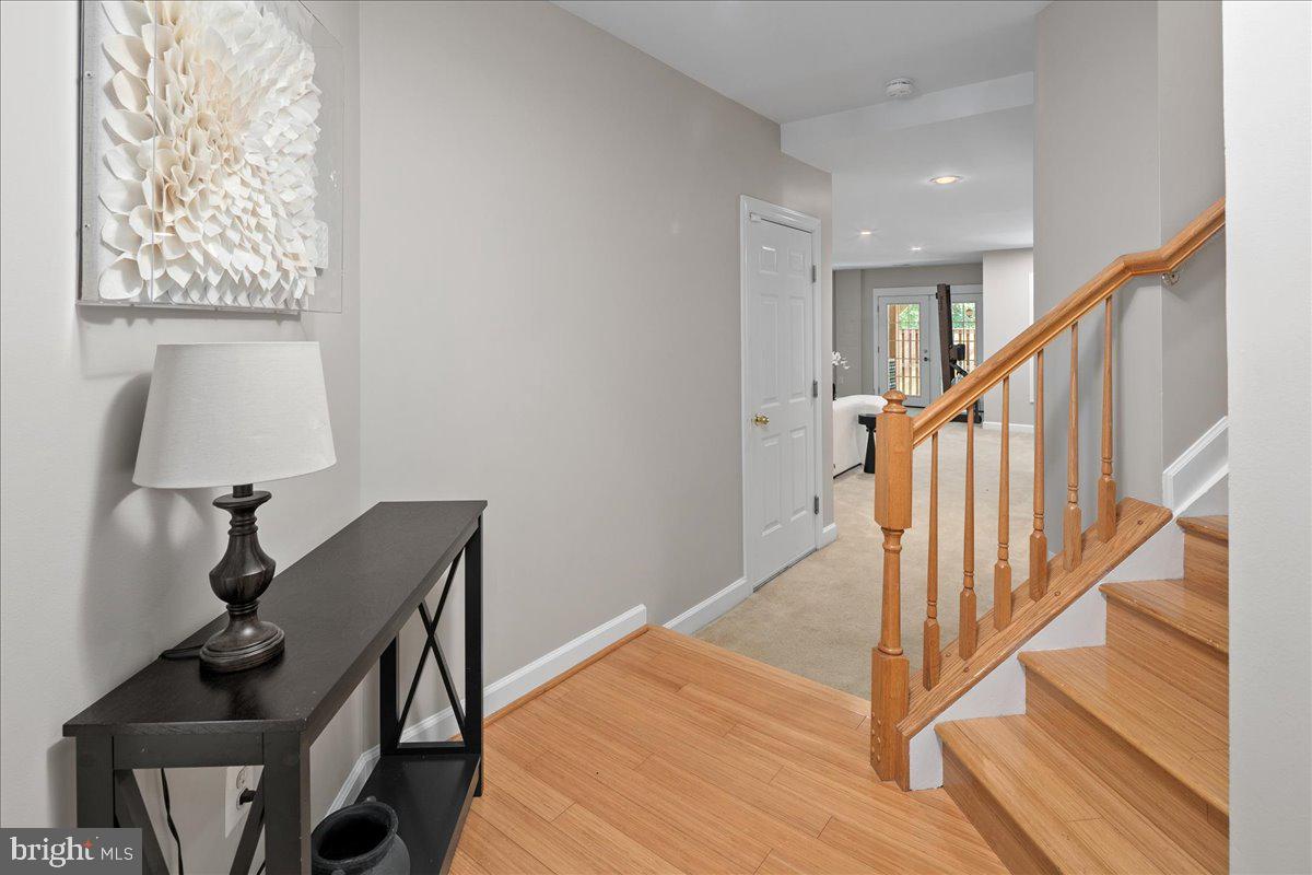 6347 Simmer Circle Springfield, VA 22150 - Photo 4 of 47 a view of entryway and hall with wooden floor