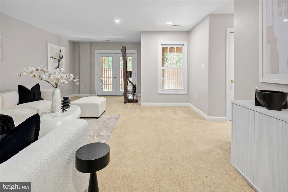 6347 Simmer Circle Springfield, VA 22150 - Photo 6 of 47 a living room with furniture and a fireplace