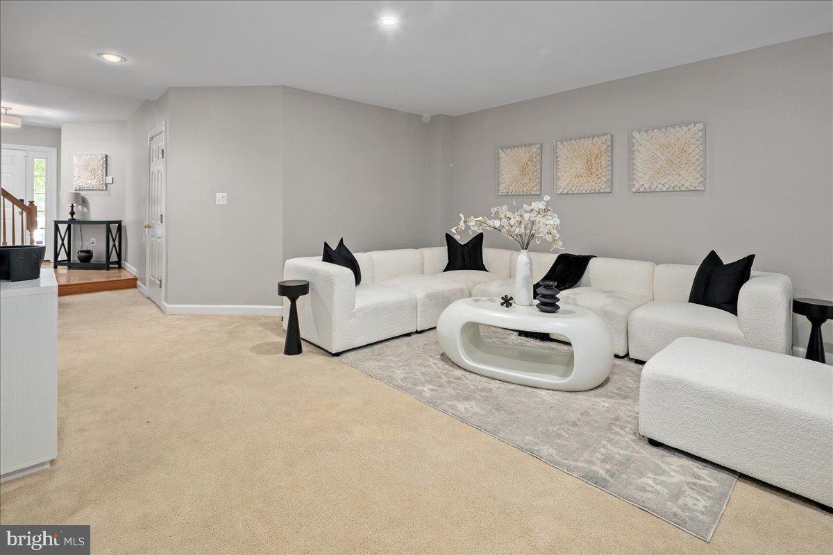 6347 Simmer Circle Springfield, VA 22150 - Photo 8 of 47 a living room with furniture and a couch