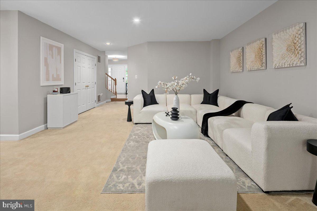 6347 Simmer Circle Springfield, VA 22150 - Photo 9 of 47 a living room with furniture and a couch