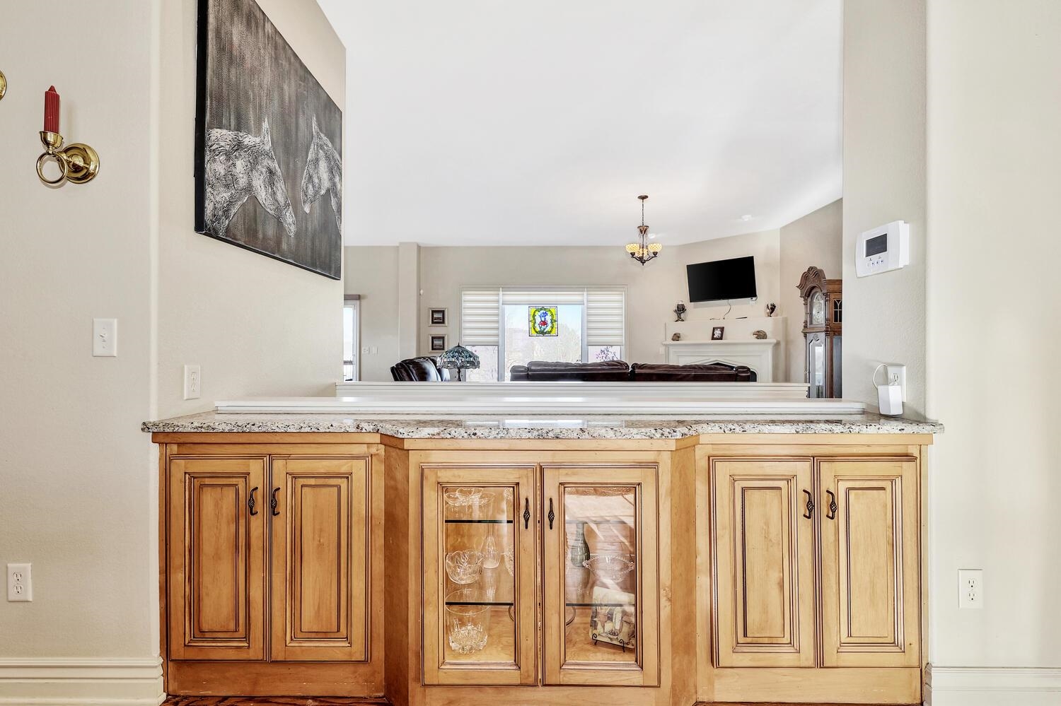 13204 East Stampede Street Wichita, KS 67230 - Photo 17 of 35 Granite counter tops, center lighted cabinet, holds all your tableware and linens for the seasons!
