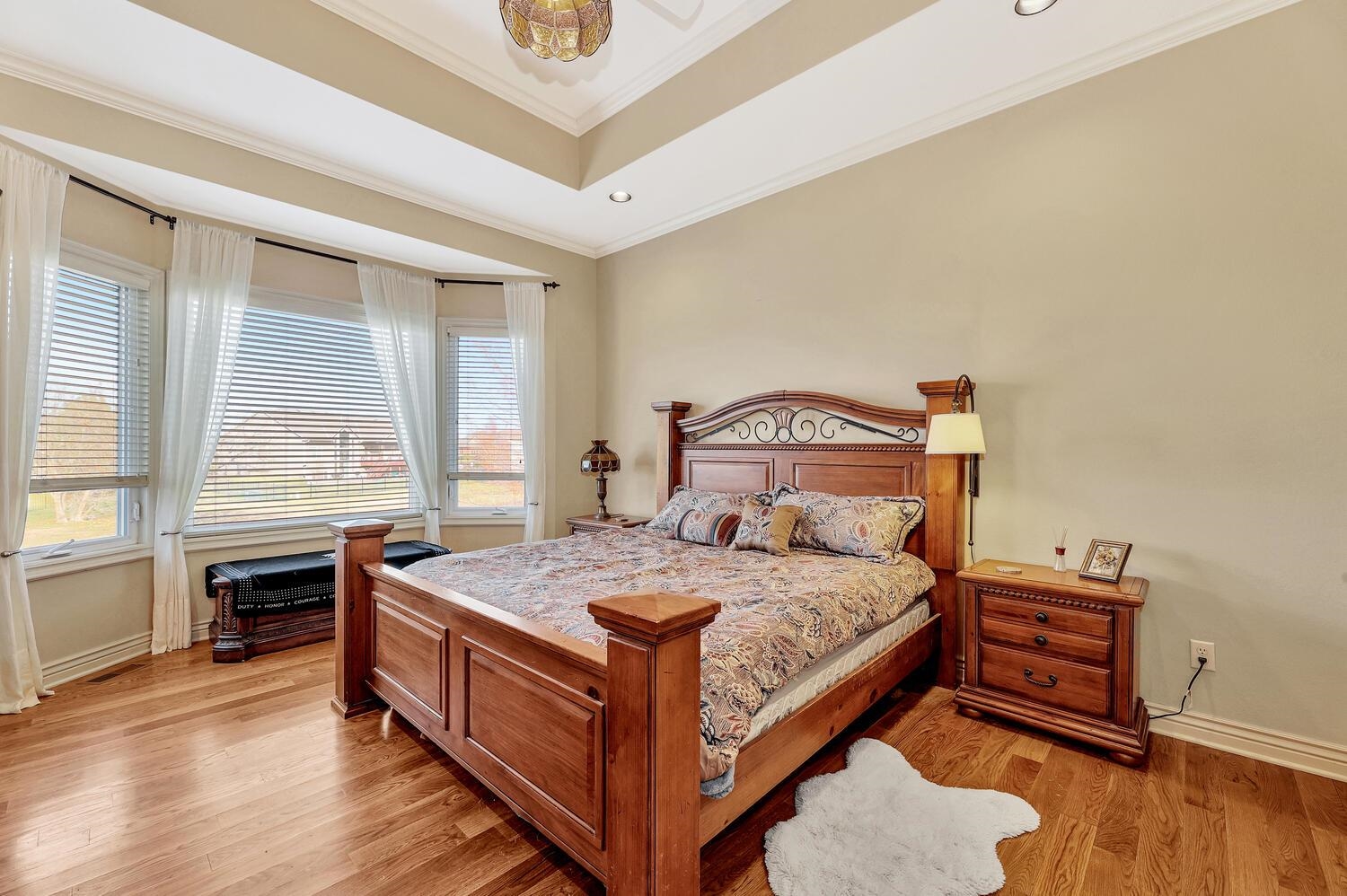 13204 East Stampede Street Wichita, KS 67230 - Photo 18 of 35 Master bedroom has large bedroom, unique ceiling, large bathroom with 2 sinks, jetted tub, separate large shower, and large closet. There is a water closet for the toilet, Seller took door off and it is in the basement.