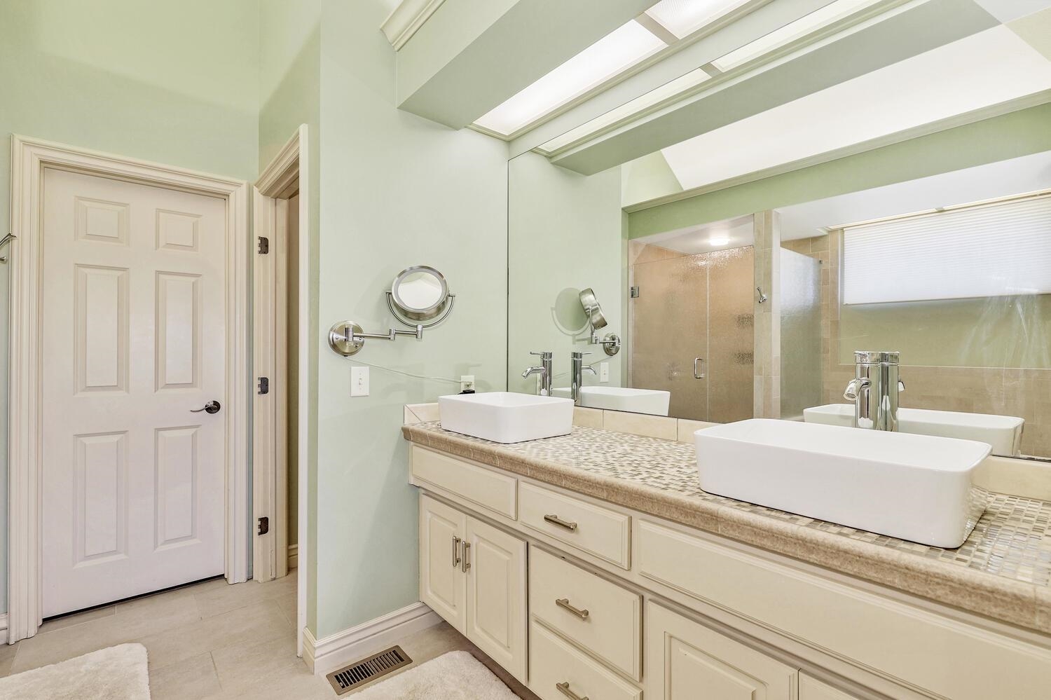 13204 East Stampede Street Wichita, KS 67230 - Photo 19 of 35 Check out the frog stoppers in the the sinks!