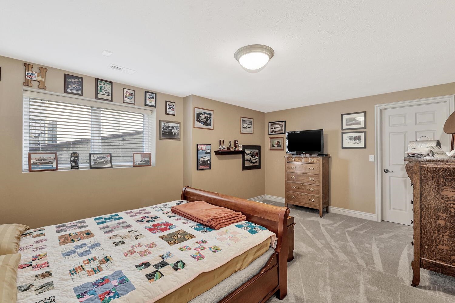 13204 East Stampede Street Wichita, KS 67230 - Photo 28 of 35 There are 2 bedrooms in the basement with a bathroom in between the rooms. At the end of the rec room. Storage room is at the bottom of the stairway.