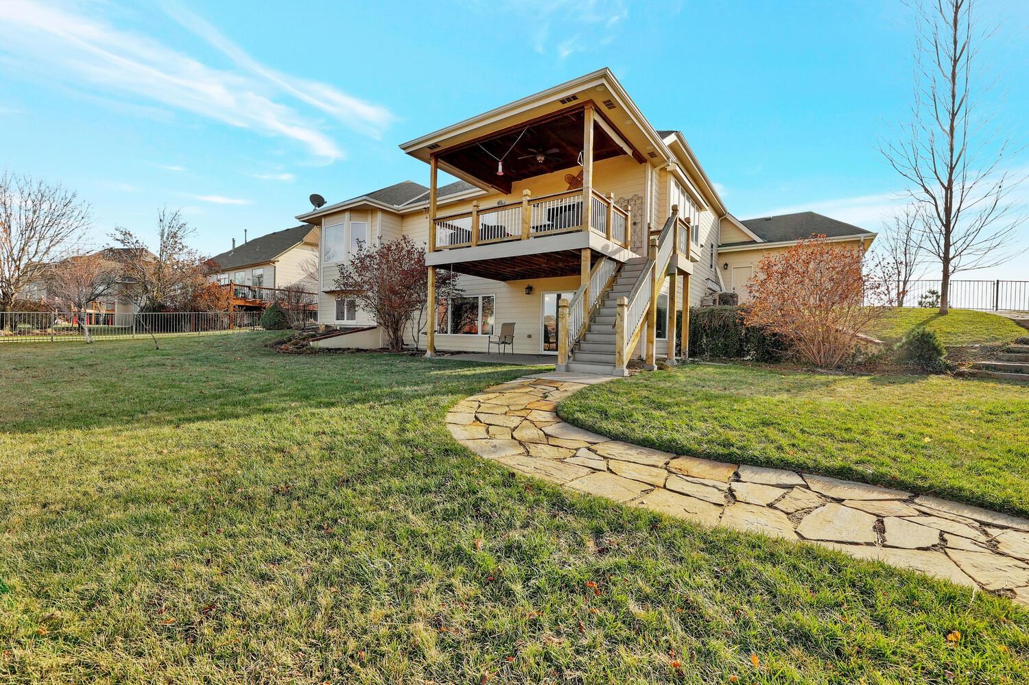 13204 East Stampede Street Wichita, KS 67230 - Photo 32 of 35 View from lake area back to the house. House has a well and sprinkler system. HOA dues.