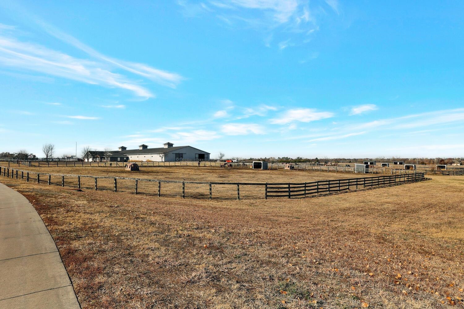 13204 East Stampede Street Wichita, KS 67230 - Photo 4 of 35 Horses are right next door in barn and riding area.
