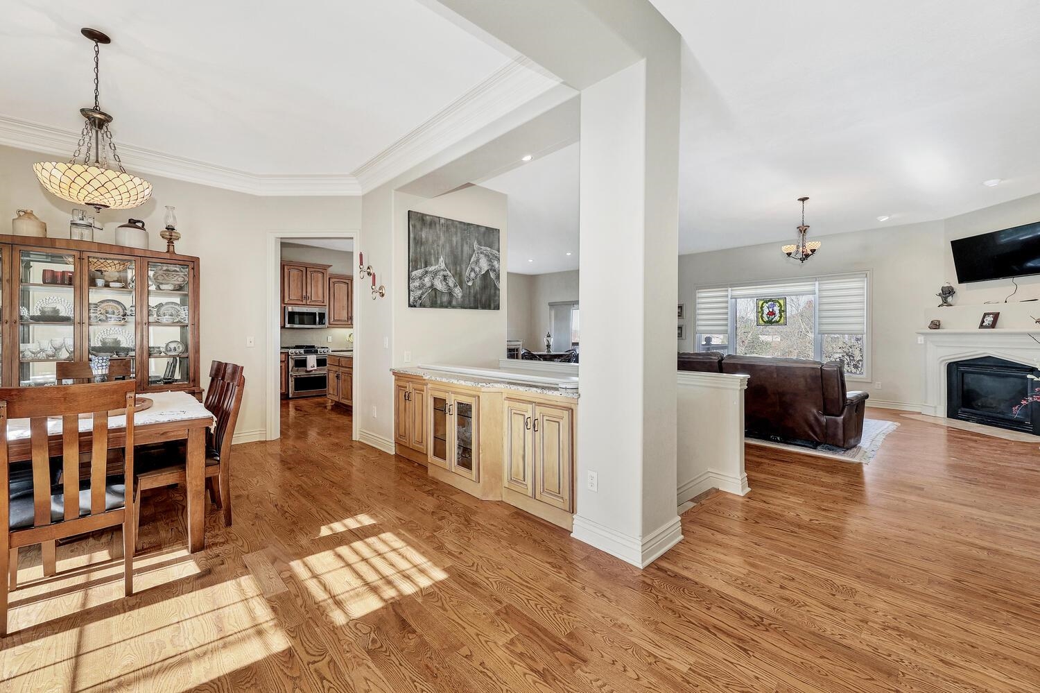 13204 East Stampede Street Wichita, KS 67230 - Photo 35 of 35 Living room, dining room and kitchen are open concept floor plan. 2 bedrooms and master bath and hall bath and laundry between kitchen and garage, are on the main floor.