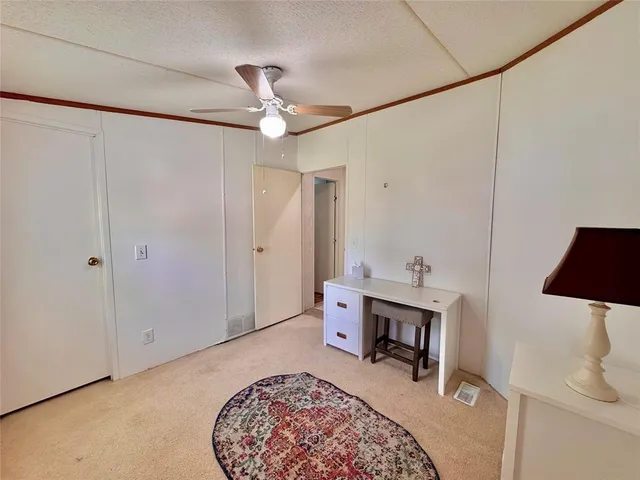 a bathroom with a sink toilet and mirror