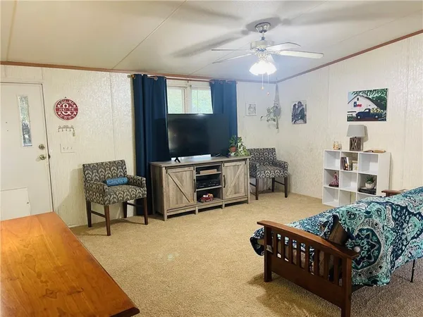 a kitchen with stainless steel appliances kitchen island granite countertop a sink and cabinets