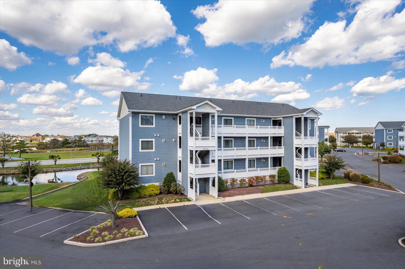 a view of a patio with a table and chairs