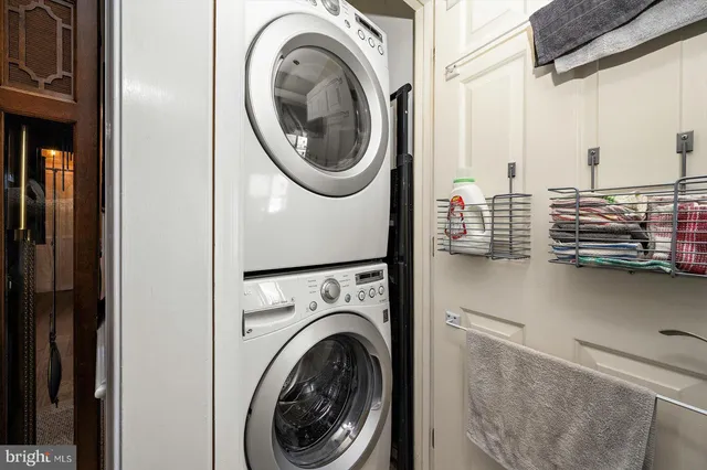 a view of a chairs and table in the balcony