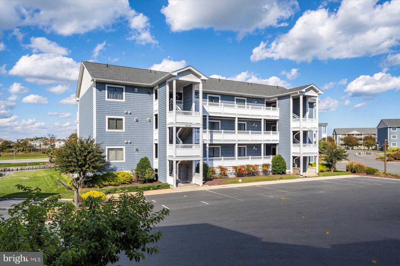 201 South Heron Drive, Unit 2D Ocean City, MD 21842 - Photo 35 of 61 a front view of a building with street view