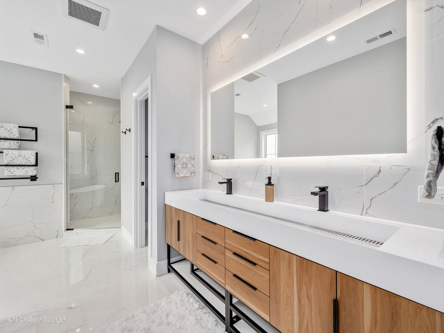 718 Justina Street Hinsdale, IL 60521 - Photo 13 of 23 a bathroom with a granite countertop sink mirror and double