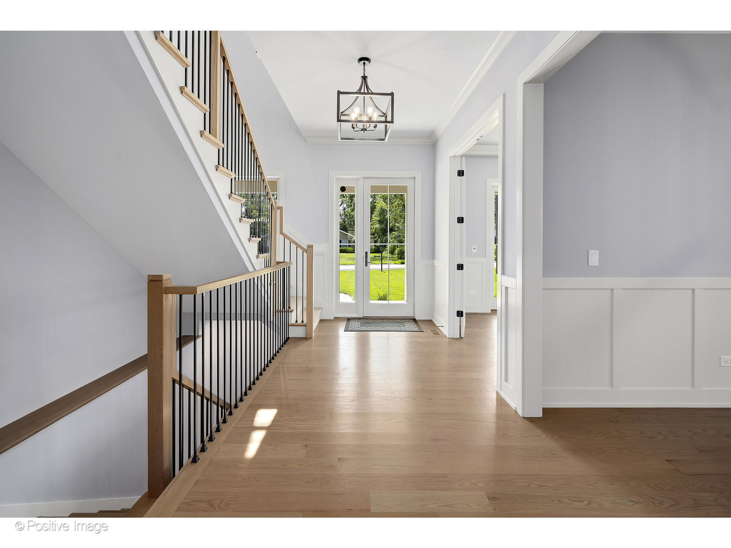 718 Justina Street Hinsdale, IL 60521 - Photo 16 of 23 a view of an entryway with wooden floor