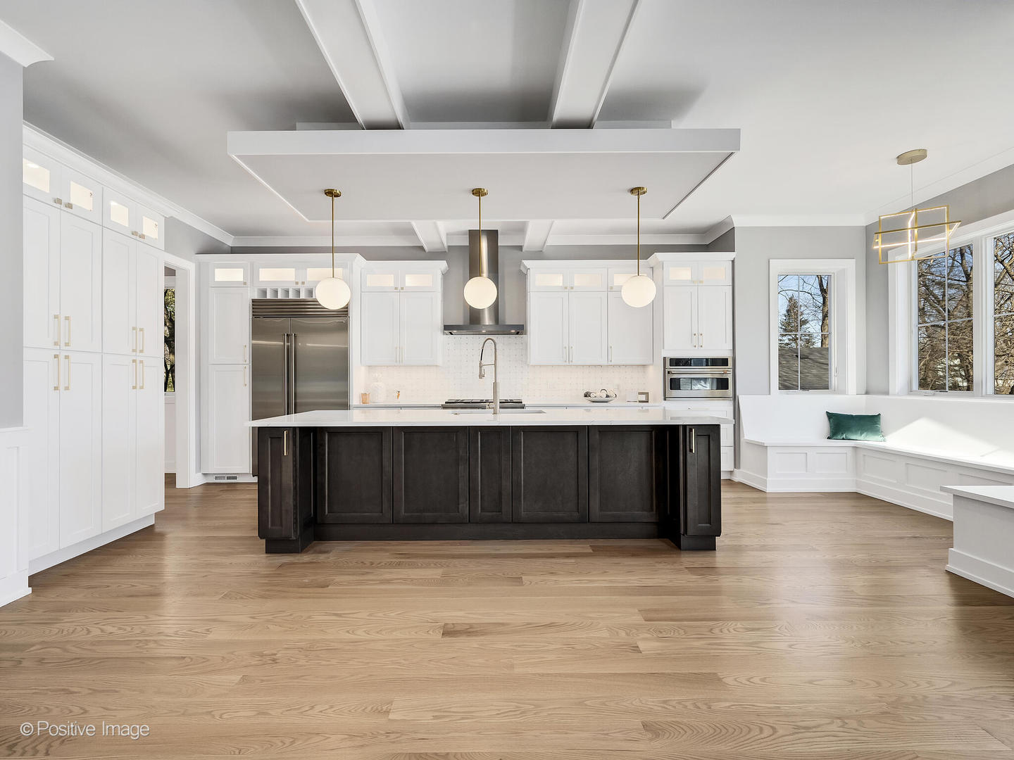 718 Justina Street Hinsdale, IL 60521 - Photo 20 of 23 a living room with stainless steel appliances kitchen island granite countertop a large counter top a sink and a wooden floors