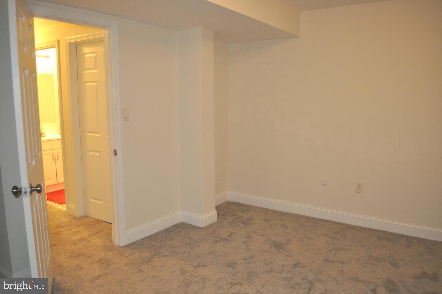 14613 Tynewick Terrace, Unit 61461 Silver Spring, MD 20906 - Photo 23 of 30 a view of an empty room