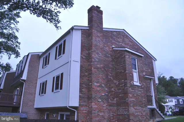 a view of a wooden fence