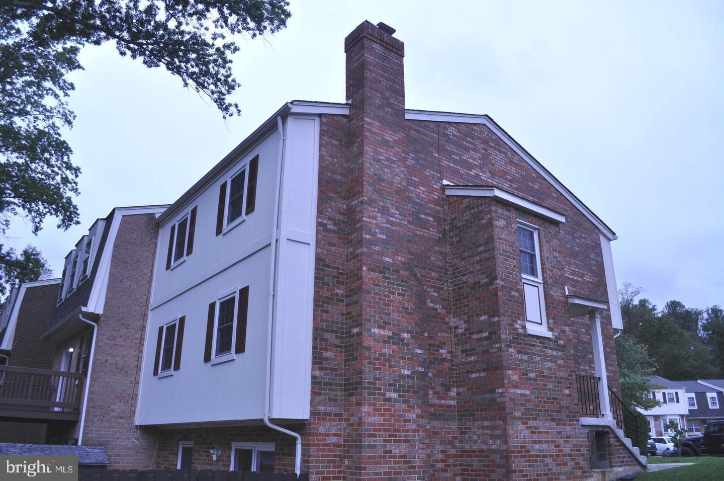 14613 Tynewick Terrace, Unit 61461 Silver Spring, MD 20906 - Photo 26 of 30 a front view of a building