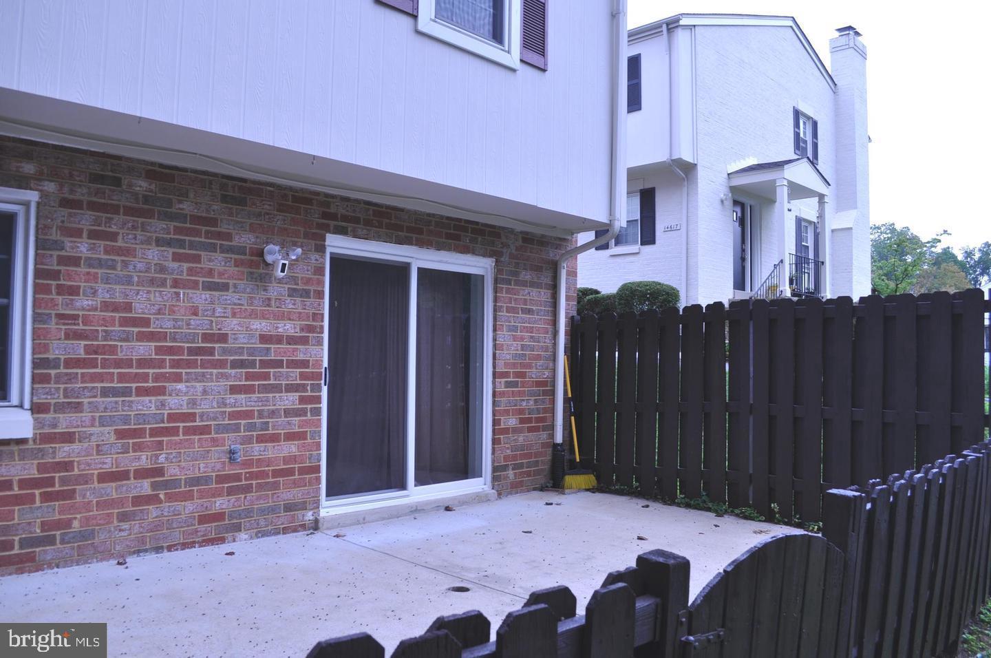 14613 Tynewick Terrace, Unit 61461 Silver Spring, MD 20906 - Photo 28 of 30 a backyard of a house