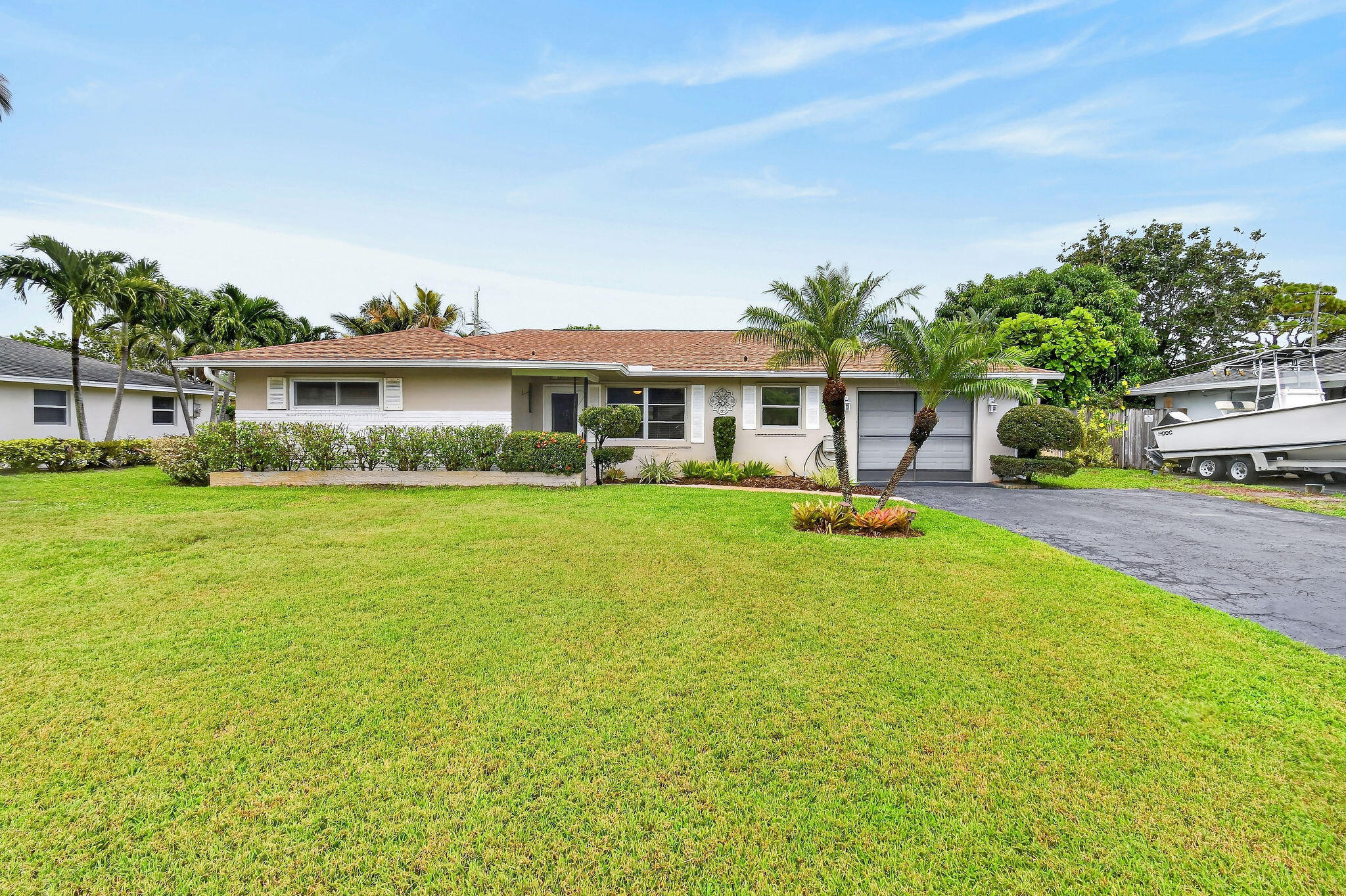 11 Windsor Road East Jupiter, FL 33469 - Photo 1 of 34 11WindsorRdE(1)