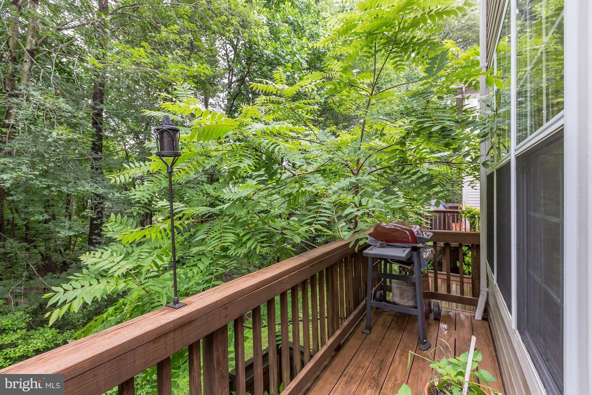 1205 Wild Hawthorn Way Reston, VA 20194 - Photo 26 of 53 Deck is extended along the entire back of home