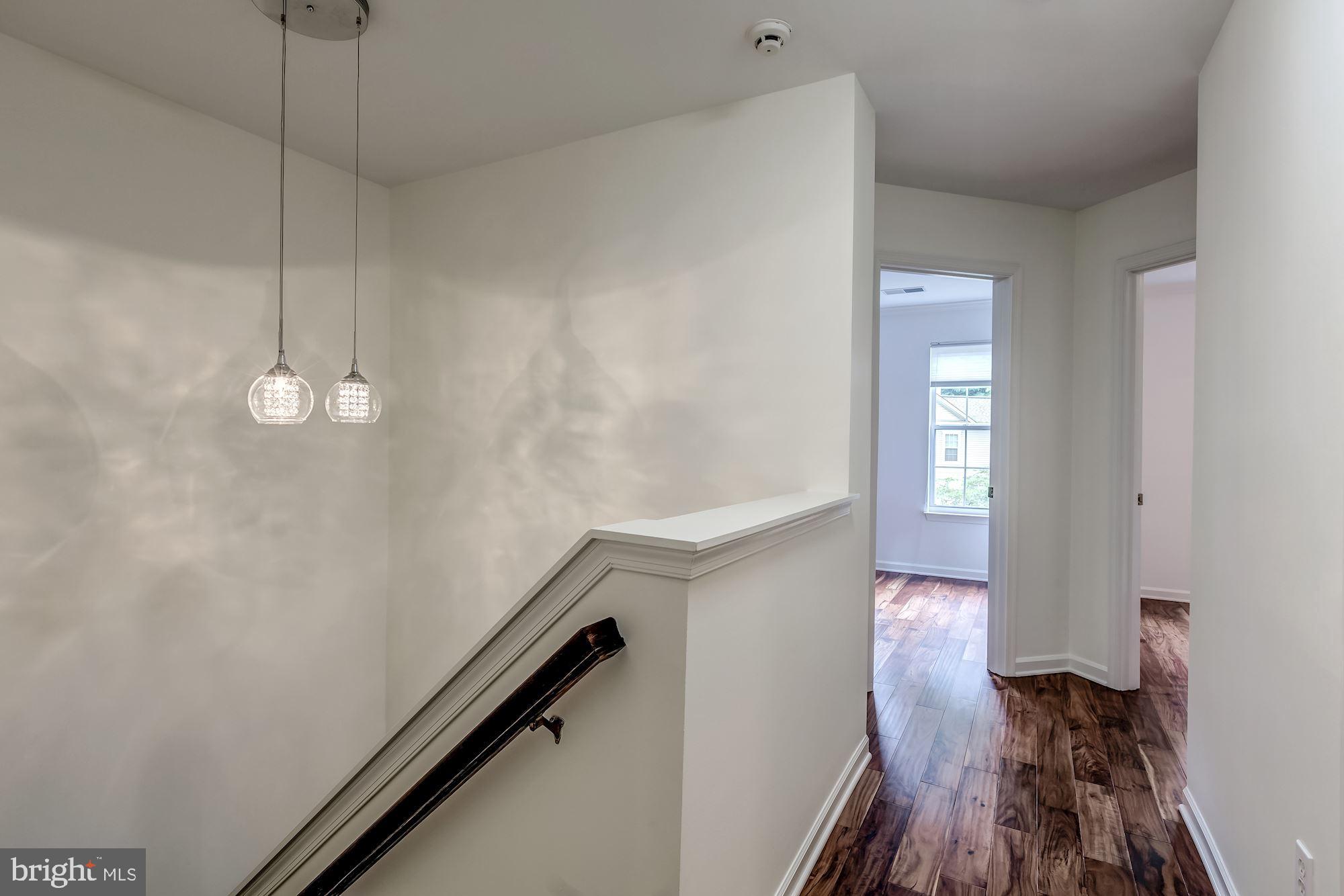 1205 Wild Hawthorn Way Reston, VA 20194 - Photo 29 of 53 Bright stairway to Upper Hallway