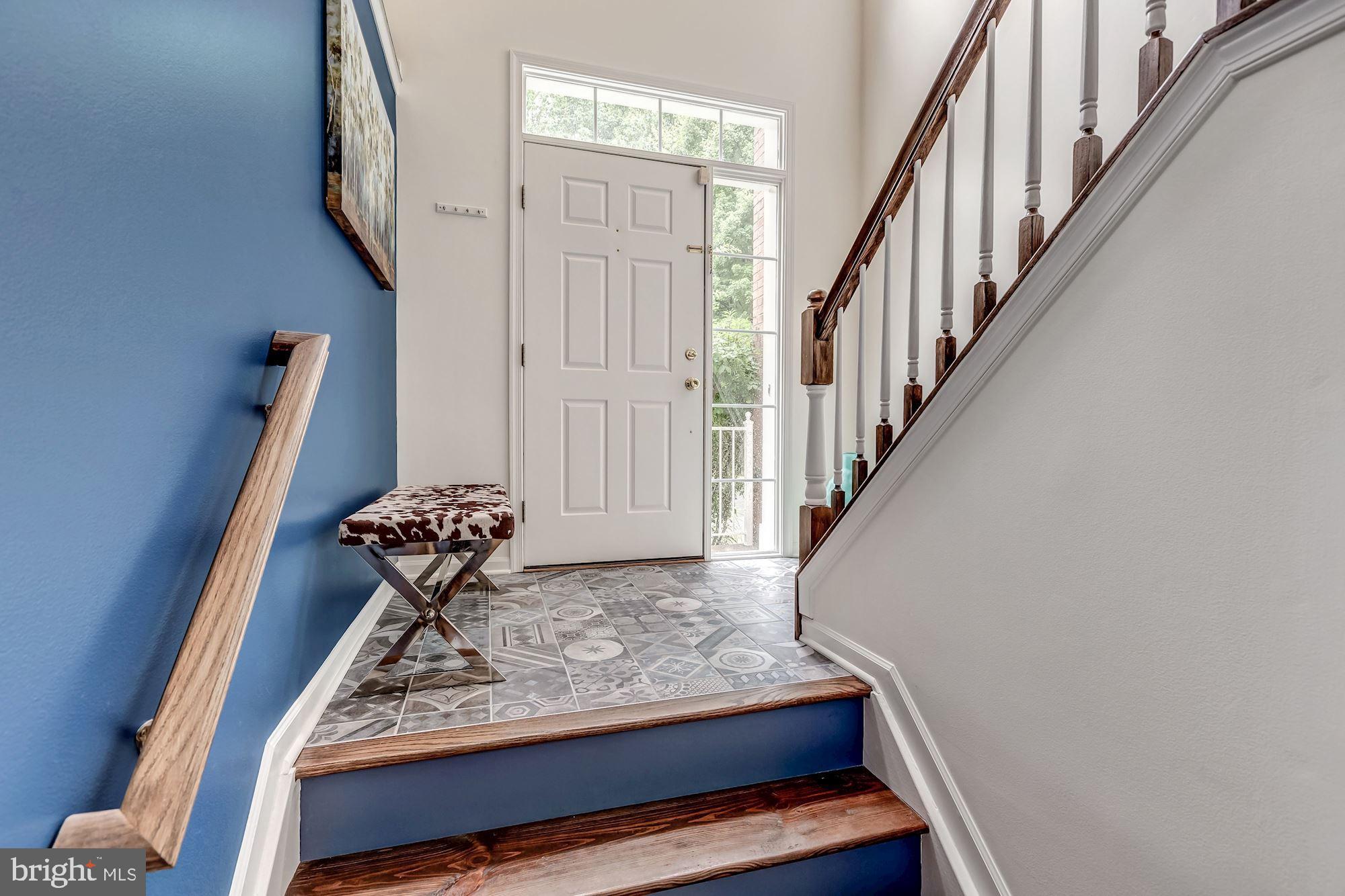 1205 Wild Hawthorn Way Reston, VA 20194 - Photo 5 of 53 Stunning Designer Tile in front Foyer