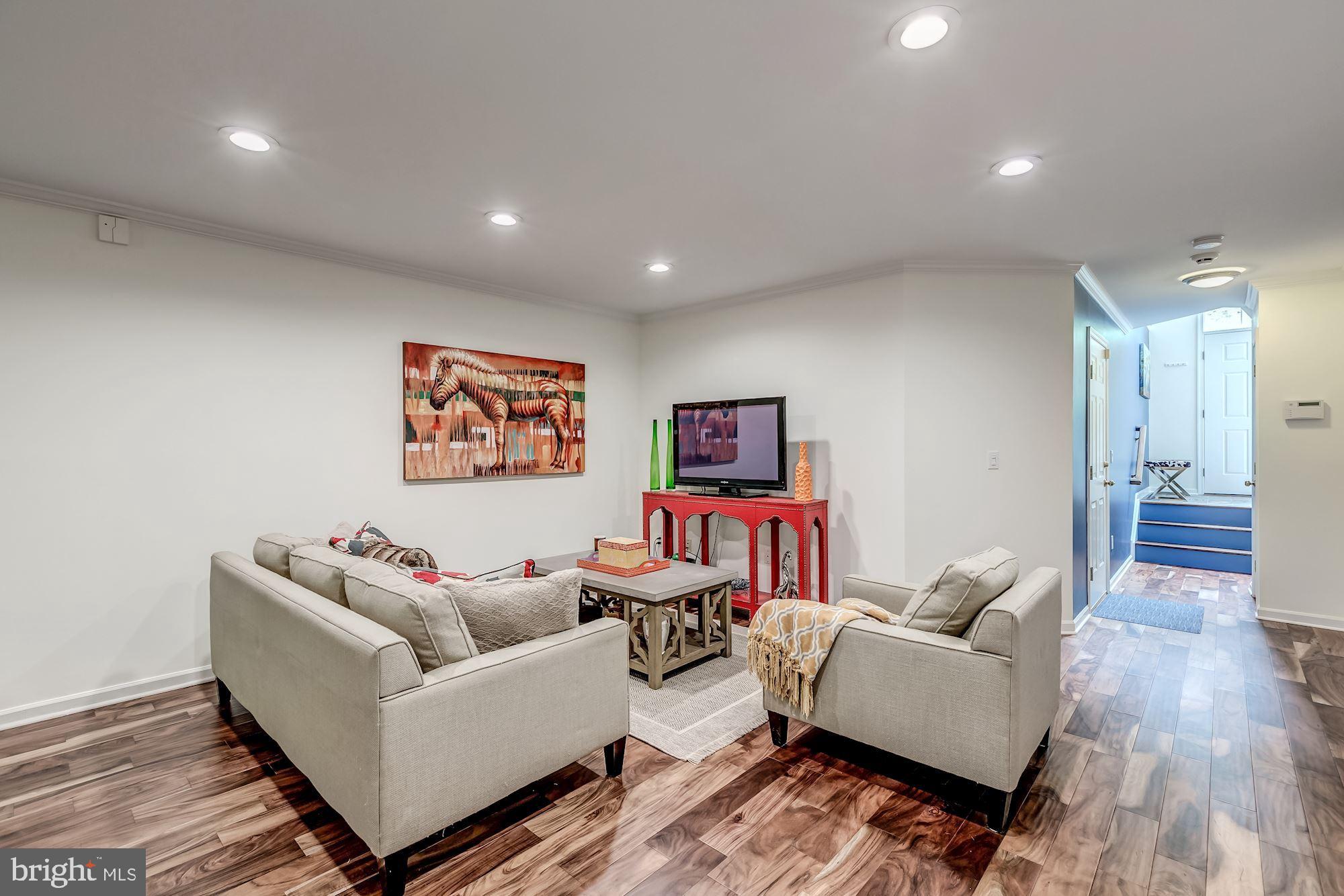 1205 Wild Hawthorn Way Reston, VA 20194 - Photo 41 of 53 Great Lower Rec Room for TV and entertaining