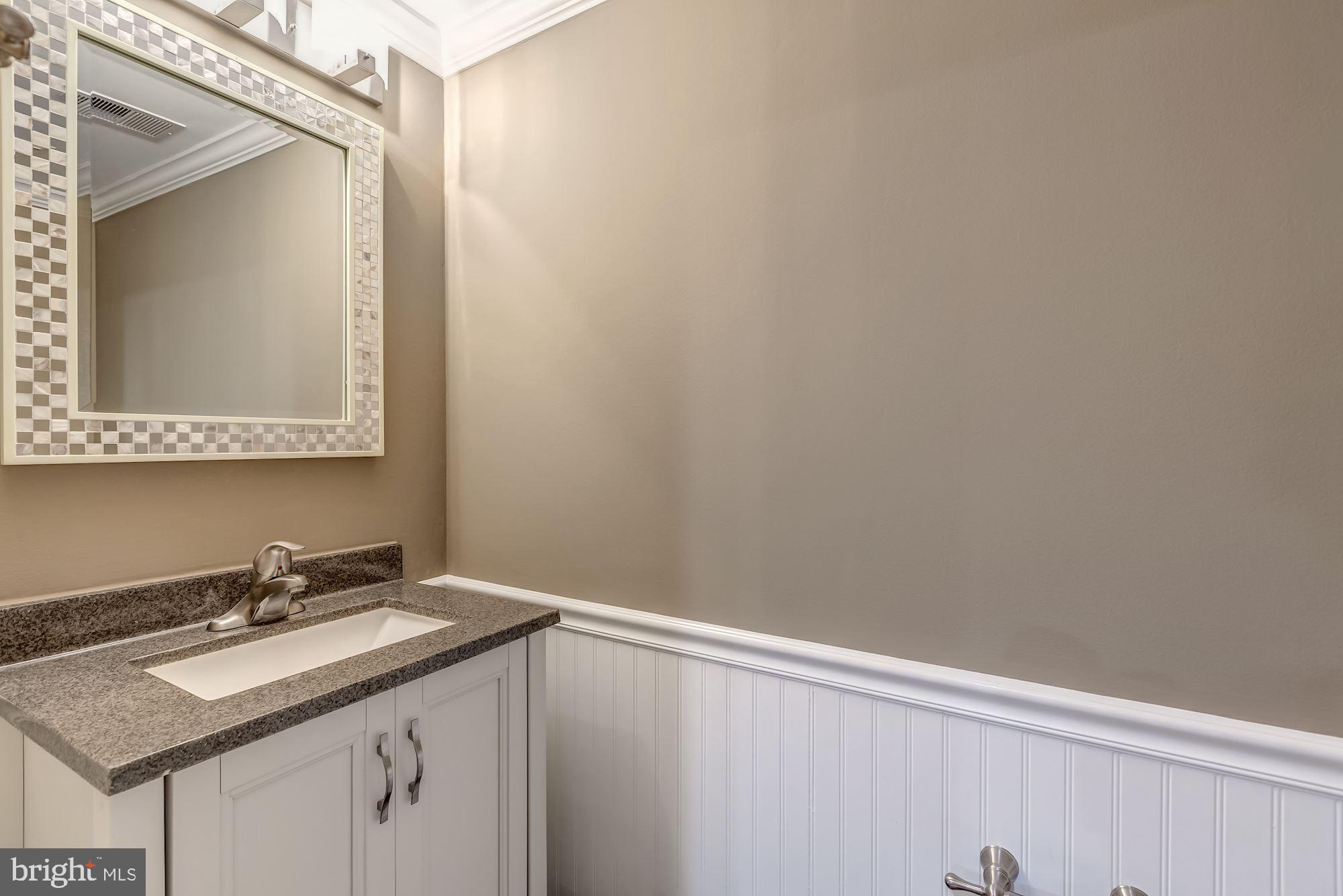 1205 Wild Hawthorn Way Reston, VA 20194 - Photo 43 of 53 Lower Level half bath has been tastefully updated