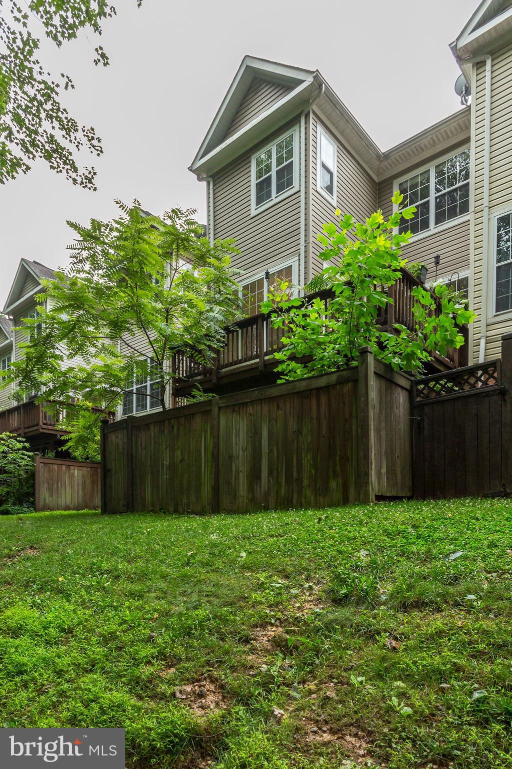 1205 Wild Hawthorn Way Reston, VA 20194 - Photo 51 of 53 Rear View of home shows fenced yard and deck