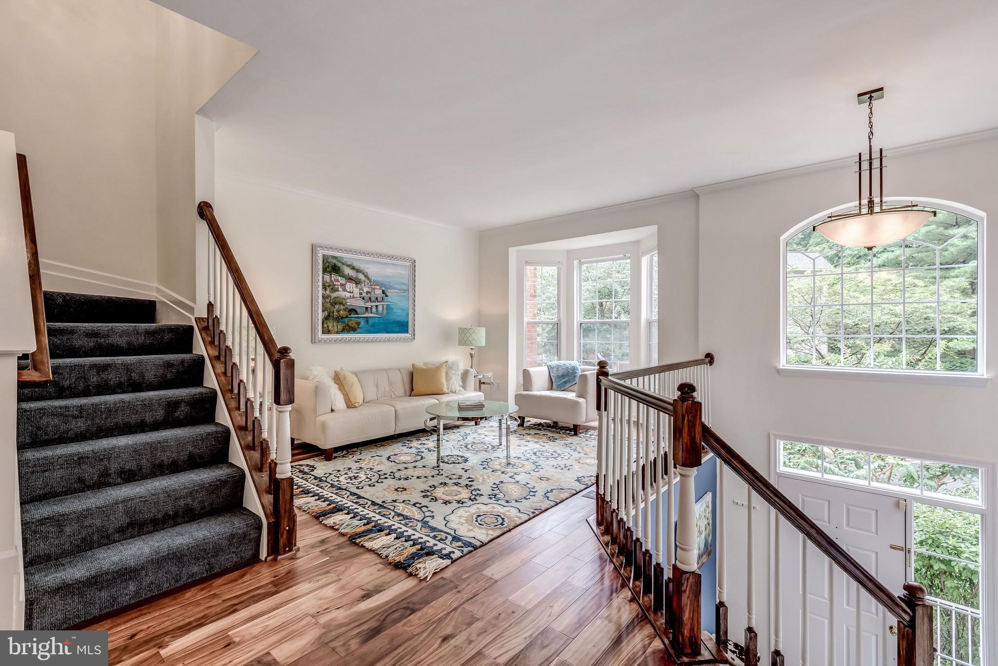 1205 Wild Hawthorn Way Reston, VA 20194 - Photo 8 of 53 Spectacular Acacia hardwood floors on all 3 levels
