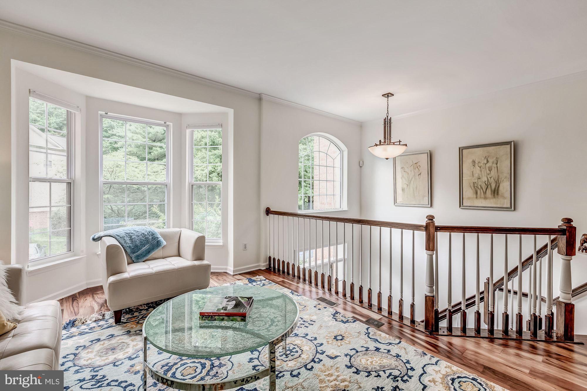1205 Wild Hawthorn Way Reston, VA 20194 - Photo 9 of 53 Living Room has bay window and opens to the Foyer