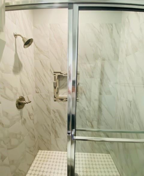 716 South Main Street, Unit 718 McGregor, TX 76657 - Photo 9 of 12 a bathroom with a shower