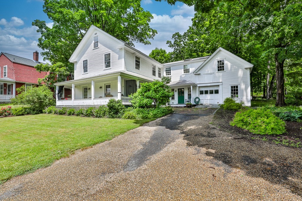 14 Still River Road Harvard, MA 01451 - Photo 1 of 39 a front view of a house with a yard and trees